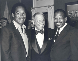 Photograph of Frank Sinatra and O. J. Simpson, unknown location, circa 1980