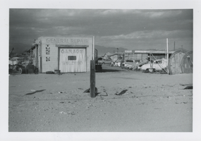 Photograph of an atuomobile repair garage and scrap yard, Las Vegas, Nevada, circa 1960s
