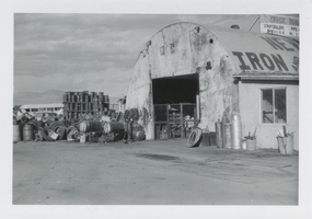 Photograph of an atuomobile repair garage and scrap yard, Las Vegas, Nevada, November 12, 1964