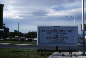 Slide of book sale sign, University of Nevada, Las Vegas, circa 1986