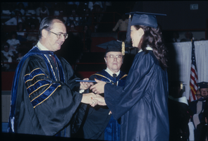 Slide of woman receiving her diploma, University of Nevada, Las Vegas, 1982