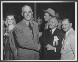 Photograph of Wilbur Clark, Arnold Porter, Bill Willard and Tommy Neary, April 1951