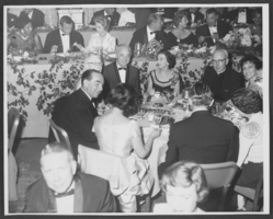 Photograph of Wilbur and Toni Clark at a formal dinner at the Hotel Astor in New York City, 1958