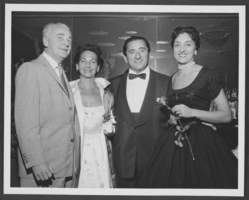 Photograph of Wilbur and Toni Clark with friends, location unknown, circa 1950s