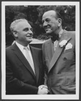 Photograph of Wilbur Clark with Noel Coward, location unknown, circa 1950s