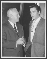 Photograph of Wilbur Clark and Elvis Presley, location unknown, circa 1950s