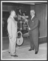 Photograph of Wilbur Clark with Vail Pittmant, location unknown, circa 1950s