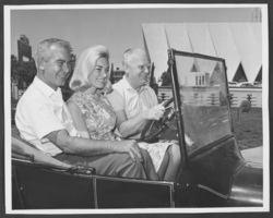 Photograph of Lou Larrimore, Wilbur Clark and unidentified woman driving, Las Vegas, Nevada, circa 1950s
