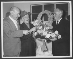 Photograph of Joe Bock, Jimmy Durante and Wilbur Clark, location unknown, circa 1950s