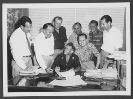 Photograph of men signing contract for Dunes Hotel, Las Vegas, 1954