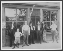 Photograph of people standing in front Pearl Barber Shop, Caliente, Nevada, circa 1910