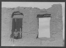 Photograph of Elbert Edwards at unidentified ruins, circa 1940s-1960s