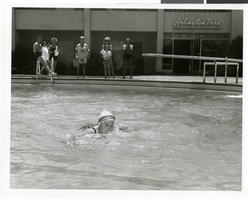 Photograph of an unidentified diving grandmother at the Sands Hotel and Casino, Las Vegas, circa 1965
