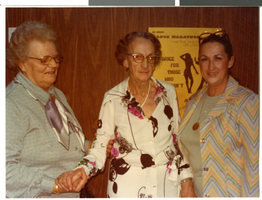 Photograph of Carolyn Trelease posing with friends, circa 1960s.