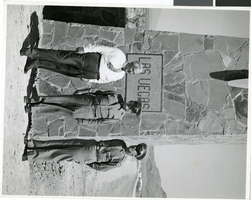 Photograph of Senator Patrick McCarran with two military officers at McCarran Airfield, Las Vegas, circa 1940s
