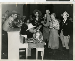 Photograph of group in Helldorado garb at Apache Hotel, Las Vegas, circa 1930s to 1940s