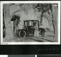 Photograph of Mrs. Park and car, circa 1920s to 1930s