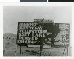 Photograph of a mileage sign, Baker, California, circa early 1900s
