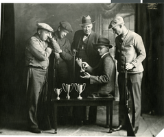 Photograph of hunters with trophies, circa 1920s to 1930s