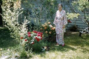 Slide of Maurine Wilson in a garden, circa 1950s