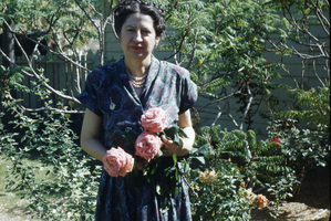Slide of Maurine Wilson and roses, circa 1950s