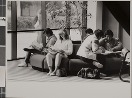 Photograph of people in the James R. Dickinson Library, University of Nevada, Las Vegas, circa 1980s