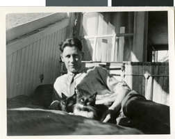 Photograph of Fred Wilson with a cat, Nevada, circa 1930s to 1940s