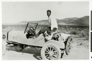 Photograph of Merle Frehner and his Model T Ford, circa 1930s
