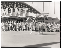 Film transparency of a woman riding a horse in the Helldorado Parade on Fremont Street, Las Vegas, Nevada, May, 1957
