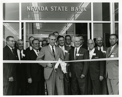 Photograph of Mayor Oran K. Gragson cutting the ribbon at the opening of Nevada State Bank, Las Vegas, Nevada, circa 1960s