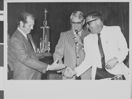 Photograph of Mayor Oran K. Gragson and Governor Grant Sawyer shaking hands, circa 1960s