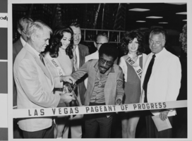 Photograph of Mayor Oran K. Gragson and Sammy Davis, Jr. cutting the ribbon for the Las Vegas Pageant of Progress, Las Vegas, Nevada, circa 1960s-1970s