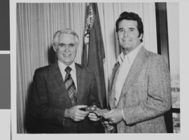 Photograph of Mayor Oran K. Gragson giving a key to the city to actor James Garner, Las Vegas, Nevada, circa 1960s
