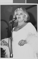 Photograph of singer Peggy Lee, taken during one of her performances, 1967