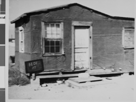 Photograph of a West Las Vegas shack house located at 1401 H Street, Las Vegas, Nevada, October, 1957