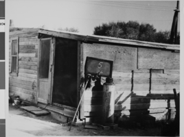 Photograph of a shack house in West Las Vegas, located at 1511 H Street, Las Vegas, Nevada, October, 1957
