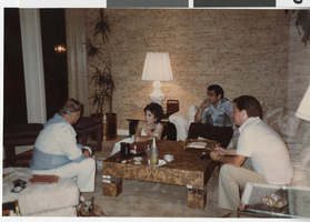 Photograph of Donn Arden and others discussing his upcoming production at the MGM, July 19, 1984.