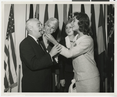 Photograph of Wilbur Clark with Patrice, Sylvia Harris, and Valda Boyne Esau at New York airport, June 1958
