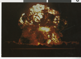 Photograph of atomic bomb exploding above ground at nuclear (atomic) test site in Nevada, Circa 1960