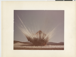 Photograph of bomb exploding at above ground nuclear test site in Nevada, Circa 1960