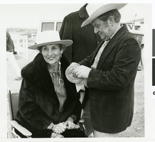 Photograph of Judy Bayley and Senator Howard Cannon at one of the trailrides, Las Vegas, Nevada, circa 1968-1971.