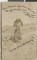 Postcard of an unidentified woman on a trail path, probably in Nevada, circa 1910s