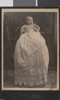 Photograph of John Clifford Brissell in his christening robe, 1902
