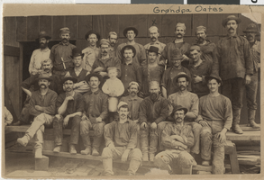 Photograph of a group of men outside of a mining building, Nevada, circa 1900s