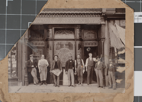 Photograph of eight men standing outside The Miners Arms, probably in Nevada, circa 1900s