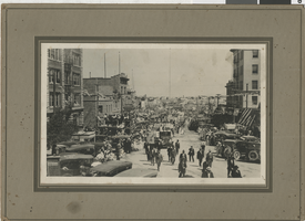 Photograph of crowds of people watching a parade, Tonopah, Nevada, circa 1910s