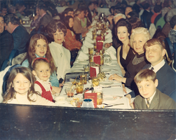 Photograph of the Sarno family with others at a banquet table, Caesars Palace, Las Vegas, Nevada, circa 1970