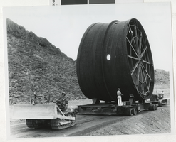 Photograph of a penstock being transported, Hoover Powerplant, 1930s.