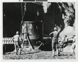 Photograph of machine dumping concrete, Hoover Dam, 1930s