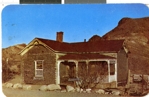 Postcard with photograph of Bottle House in Rhyolite, Nevada, 1940-1950